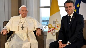 Pope Francis (L) meets with French President Emmanuel Macron at the Palais du Pharo in the southern port city of Marseille