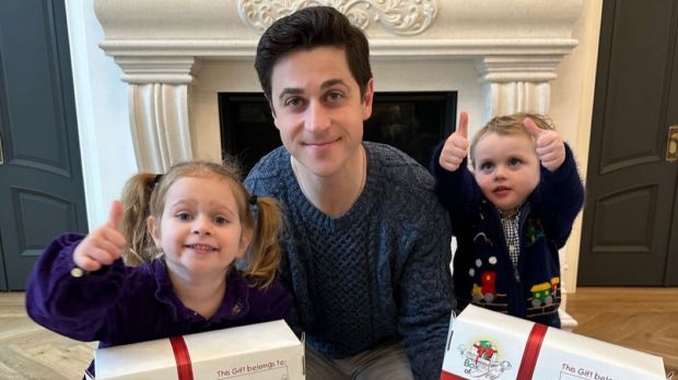 Actor David Henrie and children promoting Box of Joy