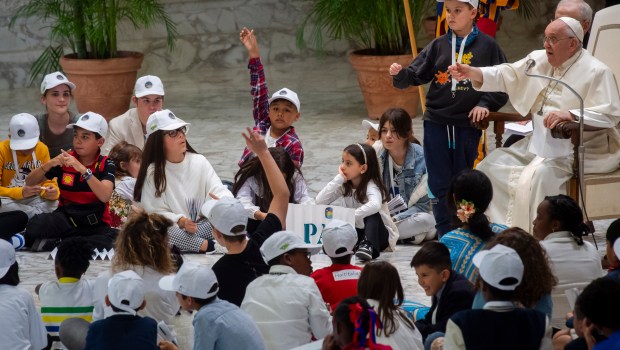 Pope Francis attends a meeting with children from all over the world