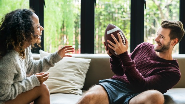 american football marriage couple happy laughing