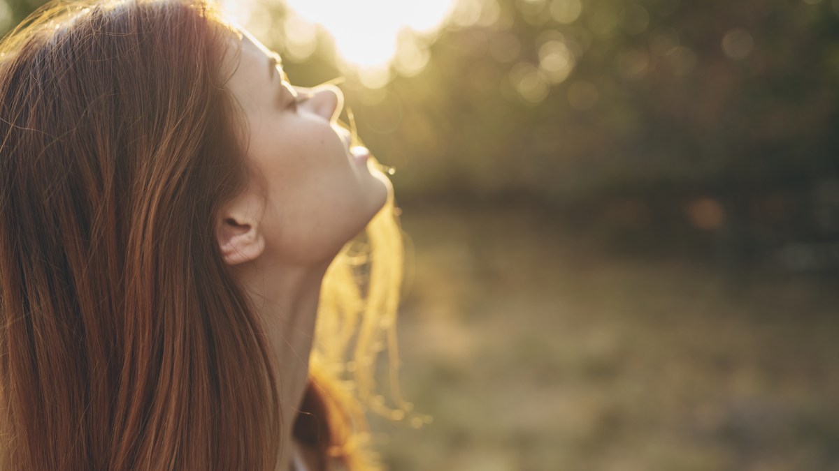 sunlight-nature-woman-raised-her-head-up