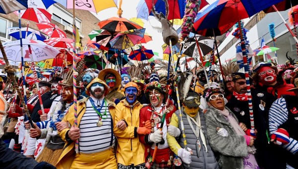 A group of fishermen in colorful costumes celebrate Mardi Gras in Dunkirk, Northern France
