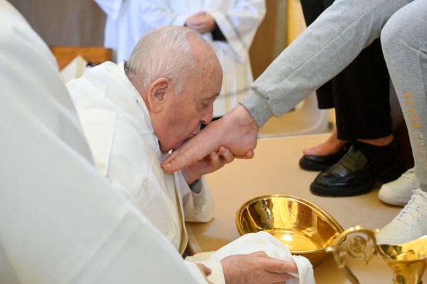Pope Francis at the Rebibbia prison for women in Rome where he performed the "Washing of the Feet" of inmates during a private visit as part of Holy Thursday