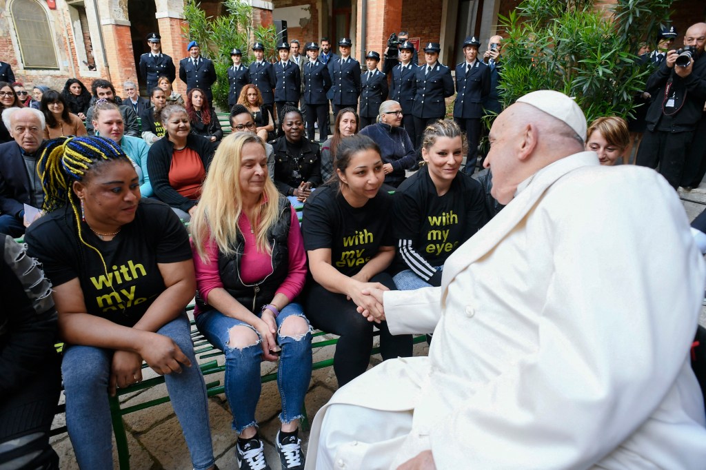 Pope Francis during a visit to inmates in the internal courtyard of the Venice Women's Prison on the Island of Giudecca as part of his visit in Venice