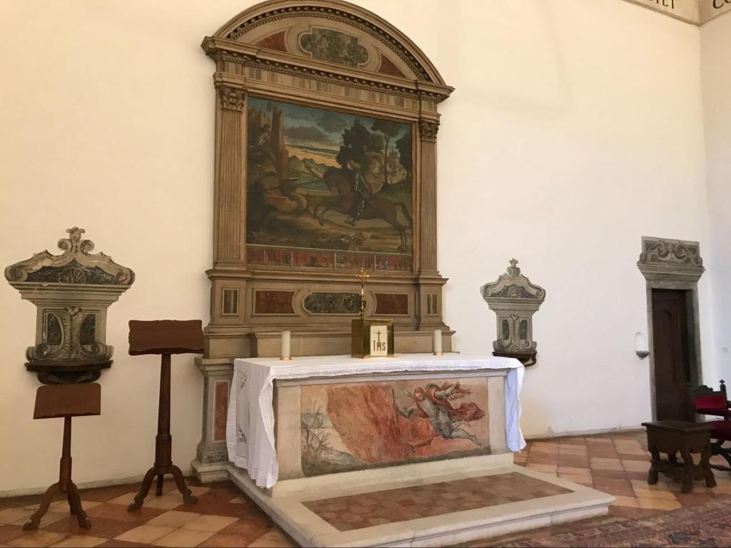 Altar of the Conclave Hall with Saint George and the Dragon of Carpaccio