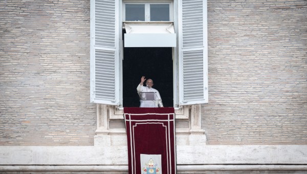 Pope Francis addresses the crowd from the window of the apostolic palace overlooking St. Peter's square during the Regina Coeli prayer on May 19, 2024 in The Vatican.