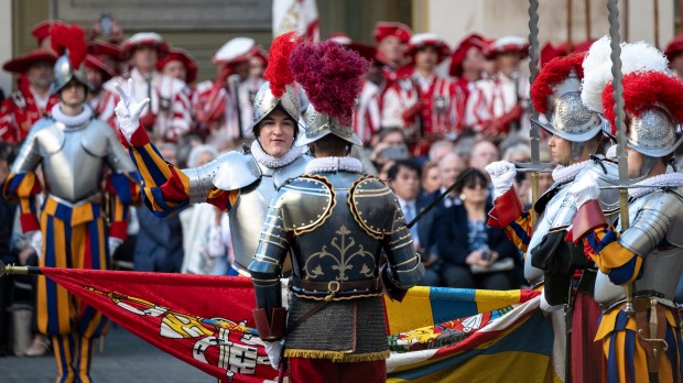 Swiss Guards take part in a swearing-in ceremony in San Damaso Courtyard, Vatican on May 06, 2024