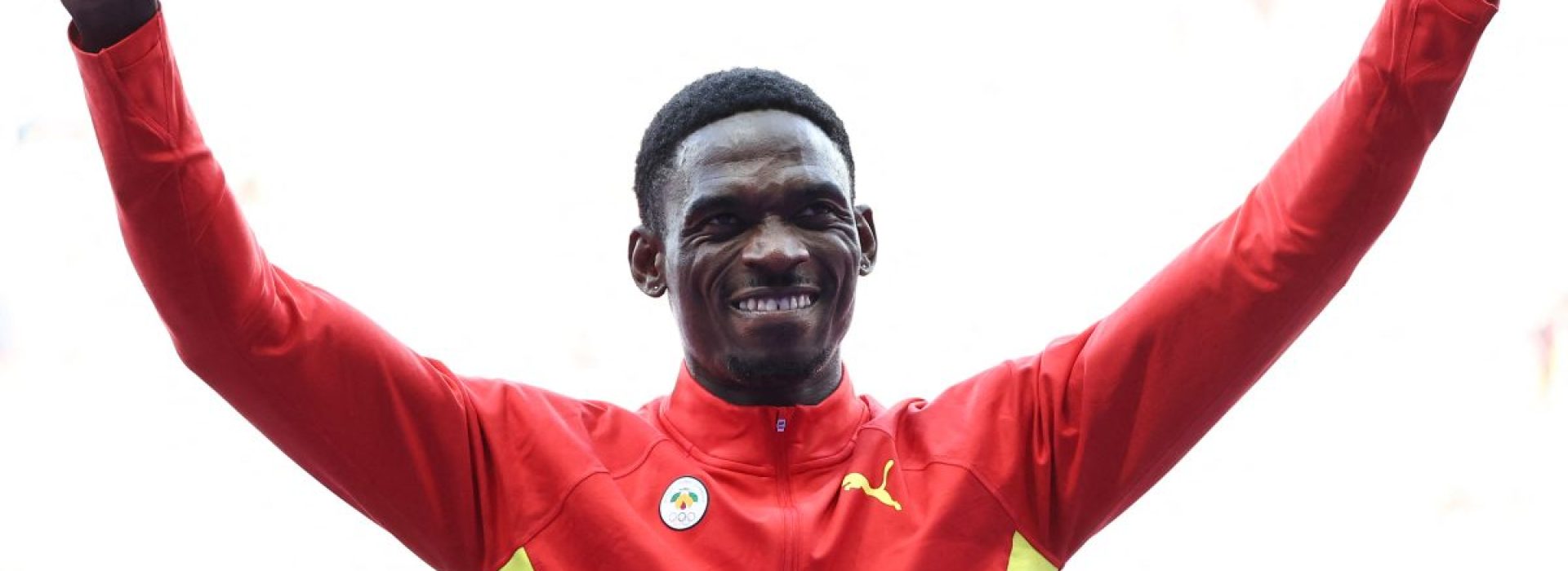 Bronze medallist Grenada's Lindon Victor celebrates on the podium during the victory ceremony for the men's decathlon athletics event during the Paris 2024 Olympic Games at Stade de France