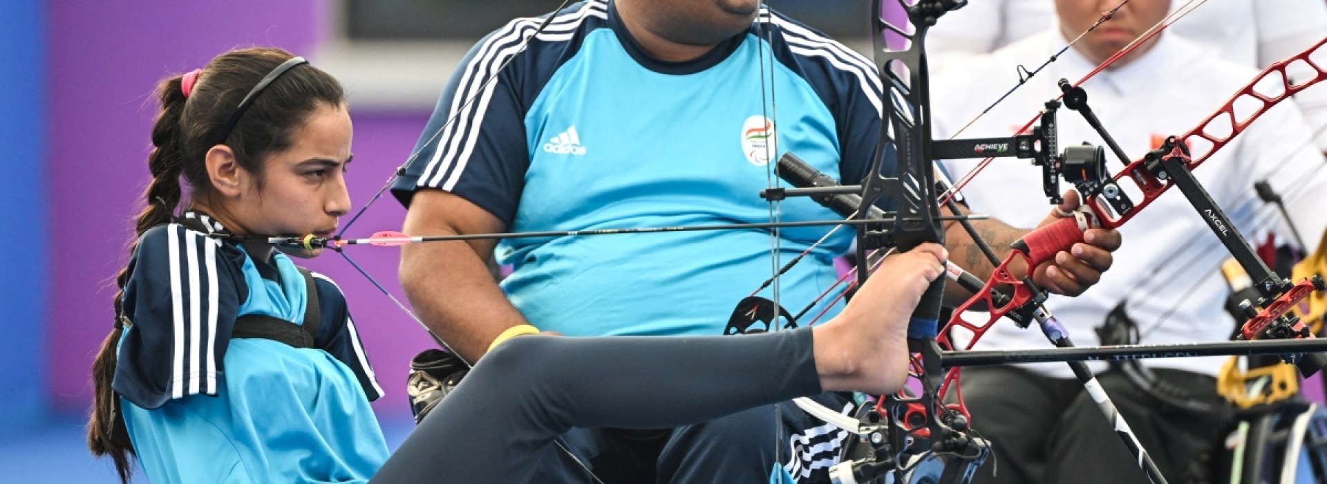 Devi Sheetal competing in archery