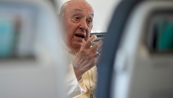 Pope Francis talks to journalists on a flight back to Rome at the end of a four-day visit to Luxembourg and Belgium on September 29, 2024