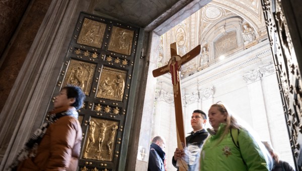 Groups of pilgrims enter St Peter's Basilica through the Holy Door a day after Pope Francis opened it for the start of the Catholic Jubilee Year 2025, in the Vatican on December 25, 2024.