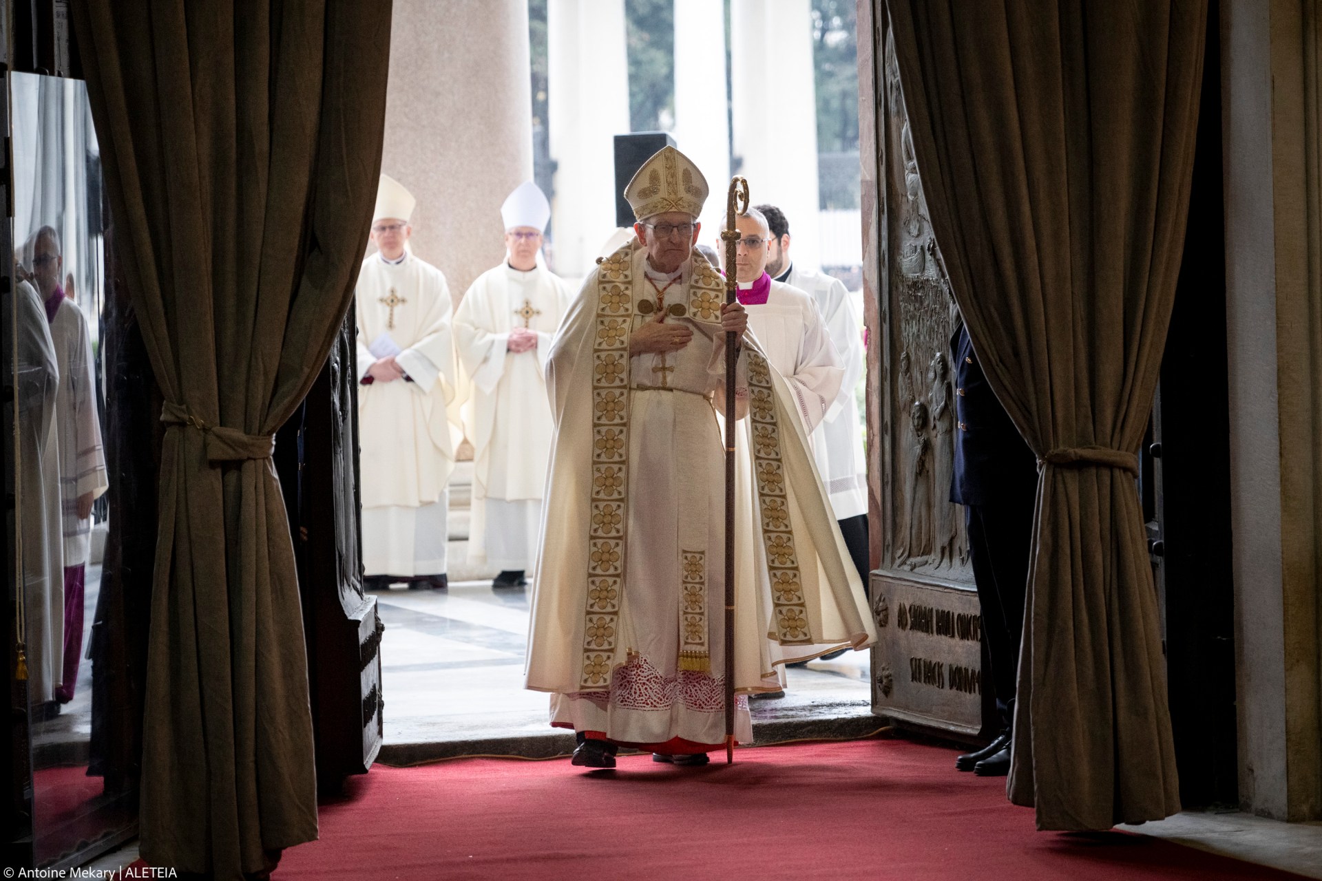 Cardinal James Michael Harvey opens the Holy Door of the Basilica of Saint Paul Outside the Walls during a ceremony for the Catholic Jubilee Year, in Rome on January 5, 2025