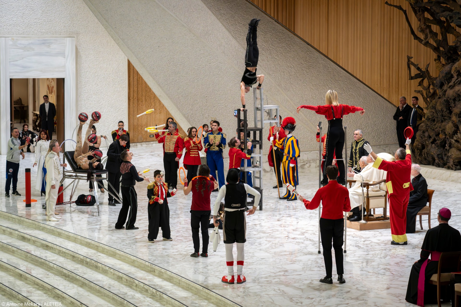 Artists of the Rony Roller Circus perform for Pope Francis during the weekly general audience at the Vatican