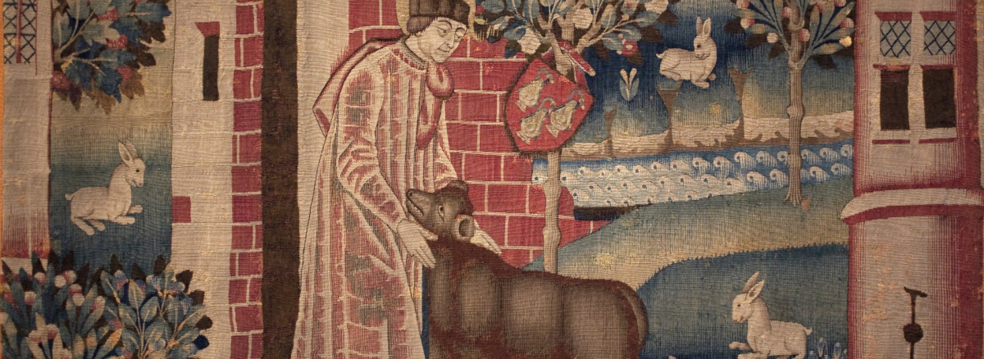 Saint Waast, ou Gaston, apprivoise un ours brun.