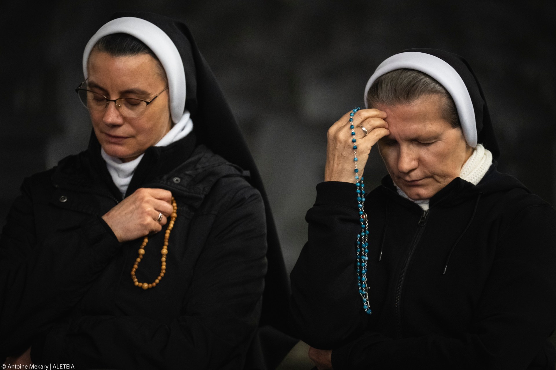 Nuns pray the rosary in St. Peter's Square at The Vatican, Friday, Mar. 14, 2025
