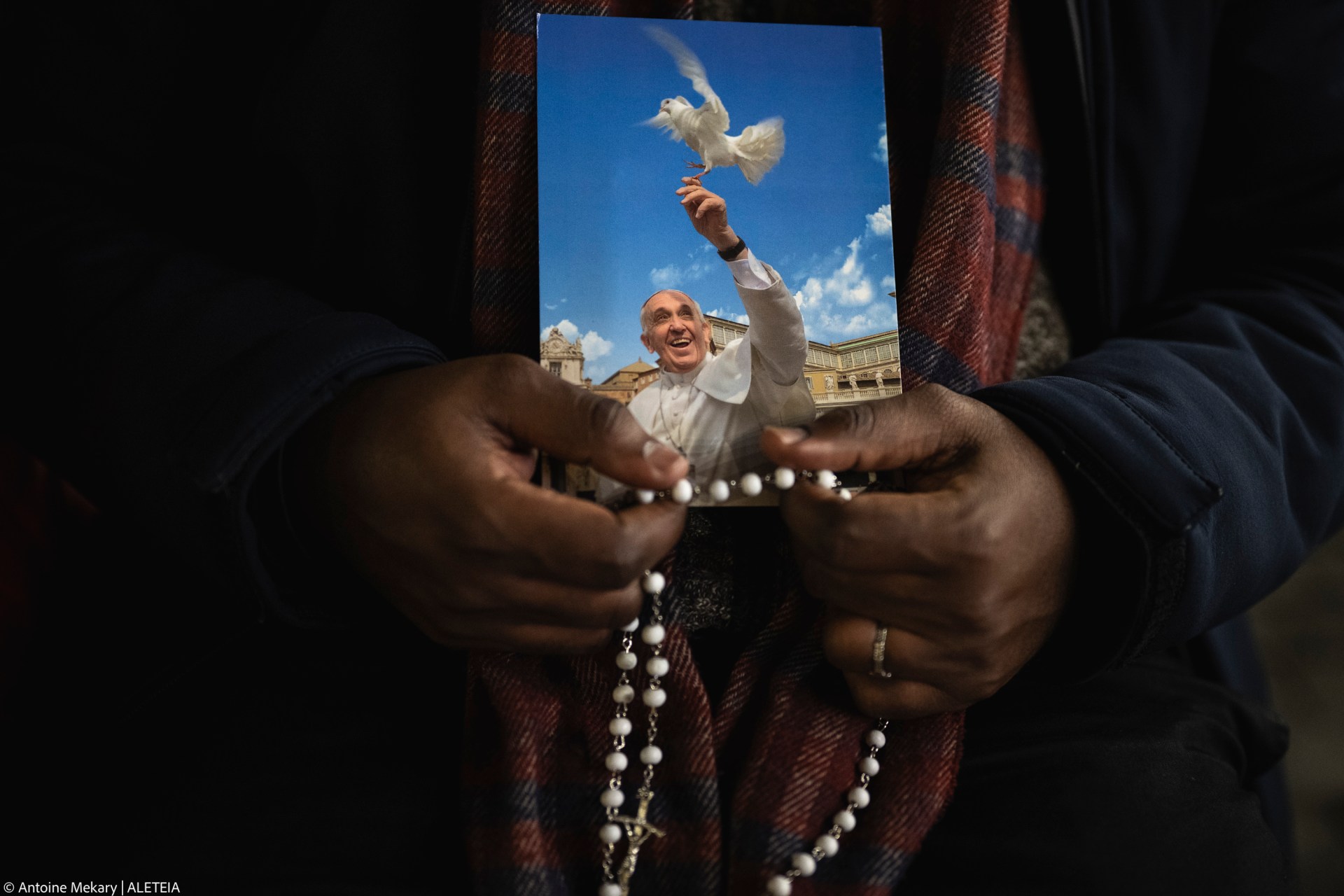 Priest pray the rosary in St. Peter's Square at The Vatican, Friday, Mar. 14, 2025