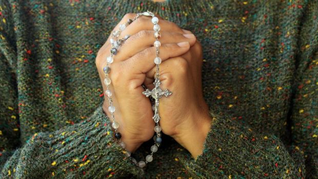 woman with rosary