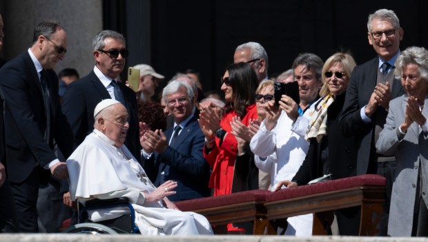Pope Francis is pushed in a wheelchair on St. Peter's square to conduct the Angelus prayer in The Vatican, on April 6, 2025.