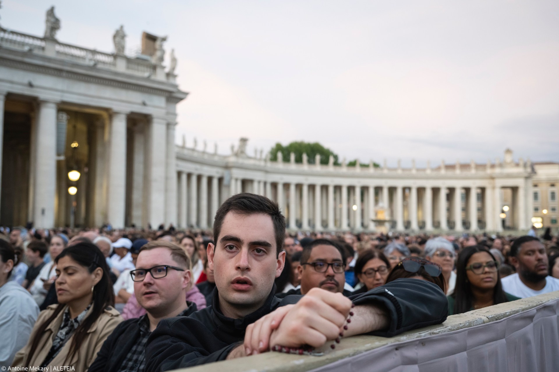 Devotees attend a Rosary in homage to Pope Francis following his death in Saint Peter's Square, the Vatican, on April 21, 2025