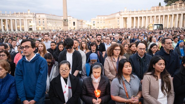 Devotees attend a Rosary in homage to Pope Francis following his death in Saint Peter's Square, the Vatican, on April 21, 2025