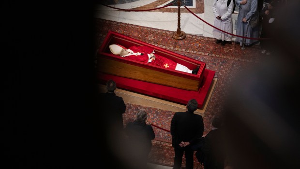 People pay their respects to late Pope Francis as he lies in state at St Peter's Basilica in The Vatican, on April 24, 2025.