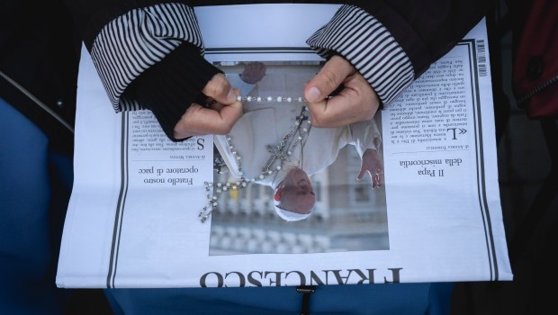 Faithful pray during the Rosary prayers in honor of Pope Francis