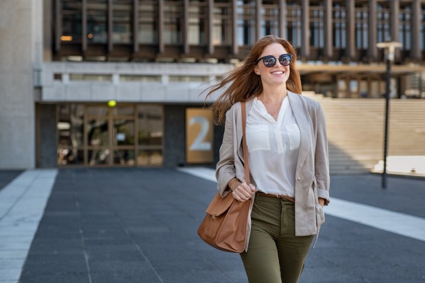 WOMAN-WALK-ALONE-STREET-CONFIDENT-SHUTTERSTOCK