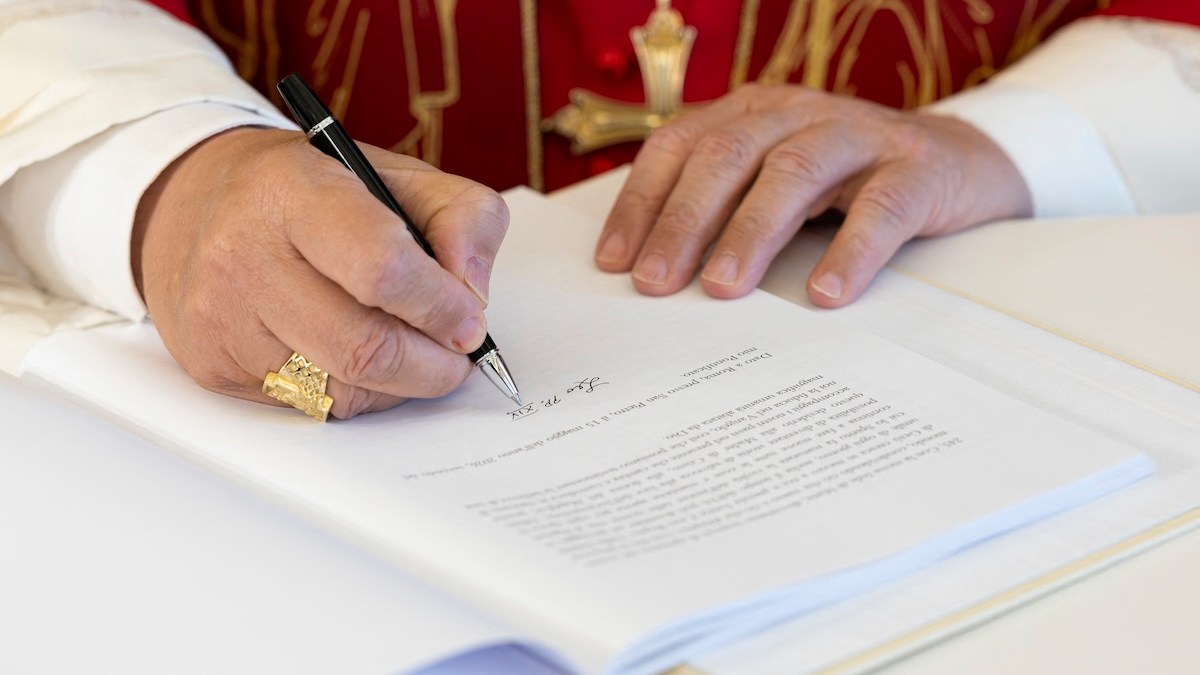 leo-signature-hands-closeup.jpg