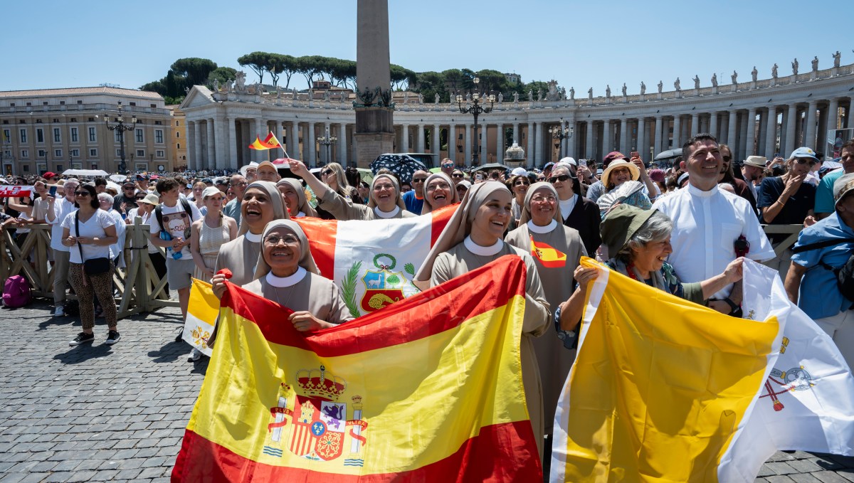 Faithful gather under the summer heat in St. Peter’s Square to participate in the Angelus prayer led by Pope Leo XIV at the Vatican, June 21, 2026.